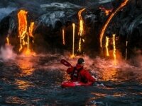 Extremals kayak along erupting volcano